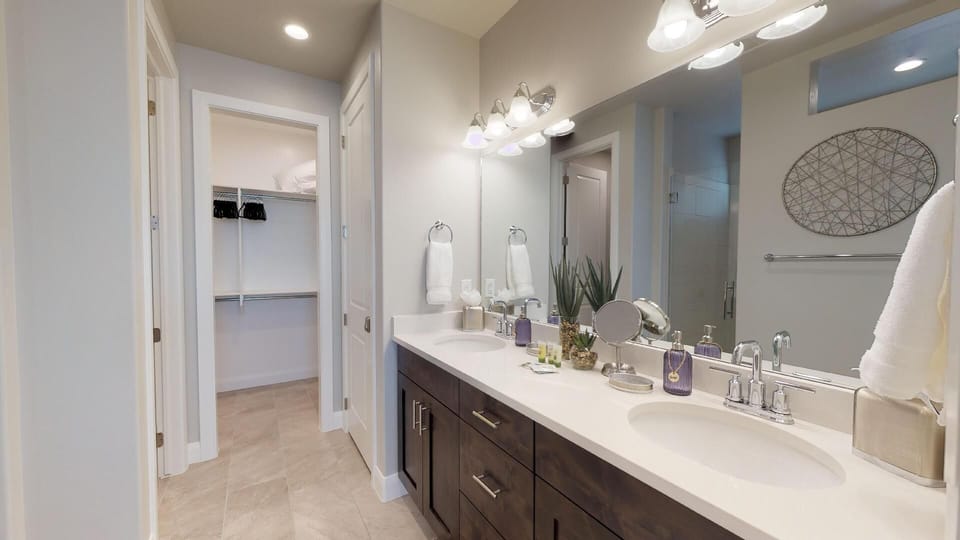 King master bath -- dual sinks, walk-in shower and large closet