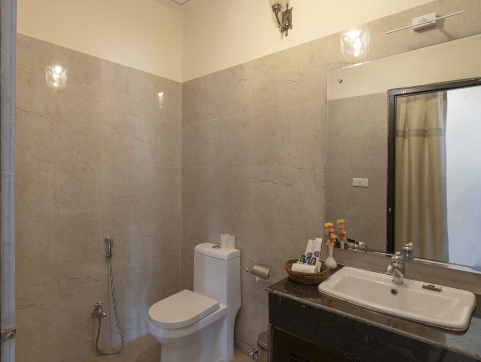Super Deluxe Room | Bathroom | Shower, free toiletries, slippers, towels