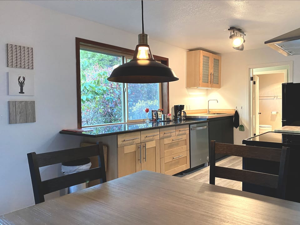 Marble counter top and large butcher top kitchen.