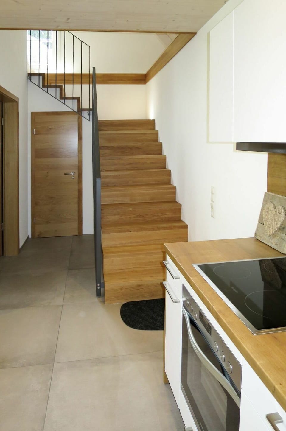 Cabinetry, Property, Building, Countertop, Kitchen Appliance, Wood, Kitchen Stove, Flooring, Interior Design