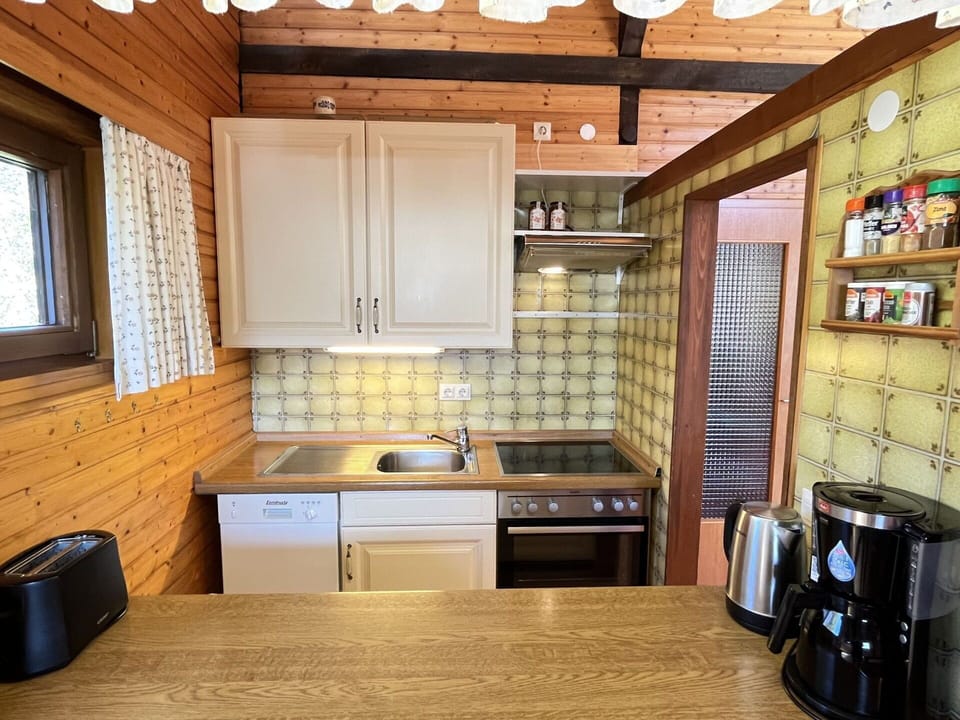 Cabinetry, Property, Window, Countertop, Building, Wood, Kitchen, Kitchen Appliance, Interior Design, Kitchen Stove