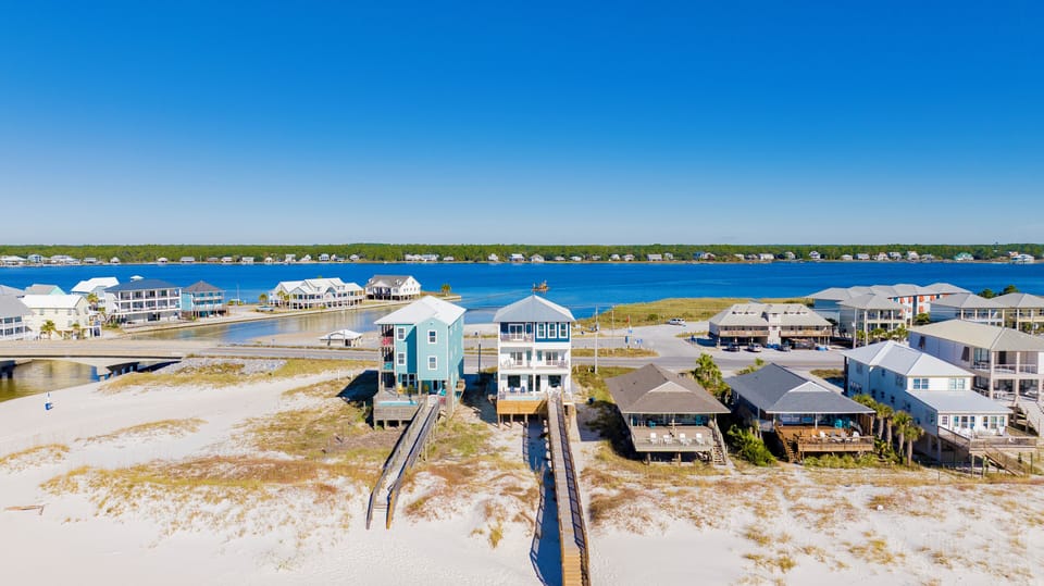 Out of the Blue is nestled between the Gulf and Little Lagoon in Gulf Shores