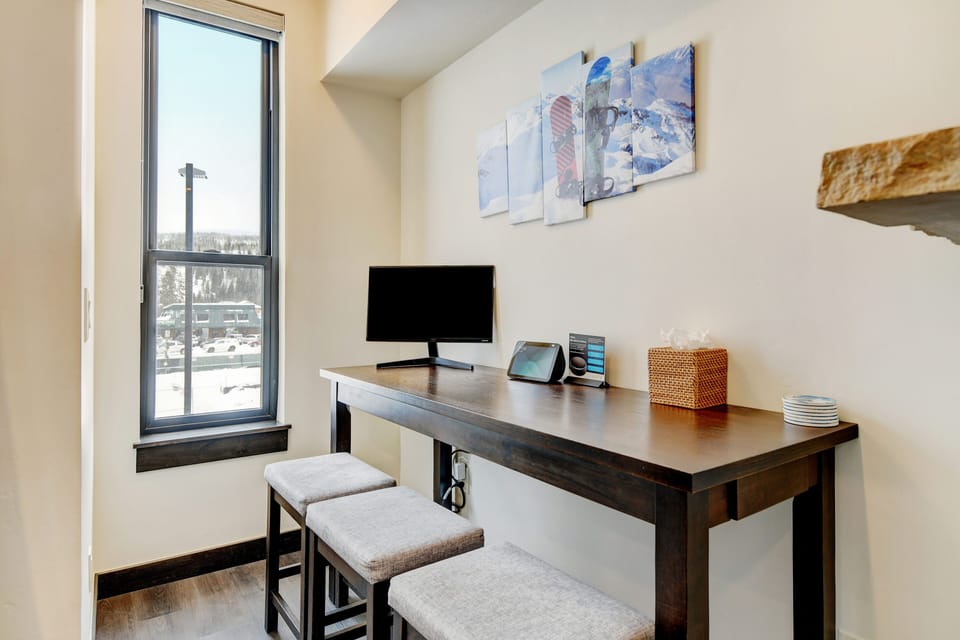 Desk Space With Monitor And Additional Seating For dining