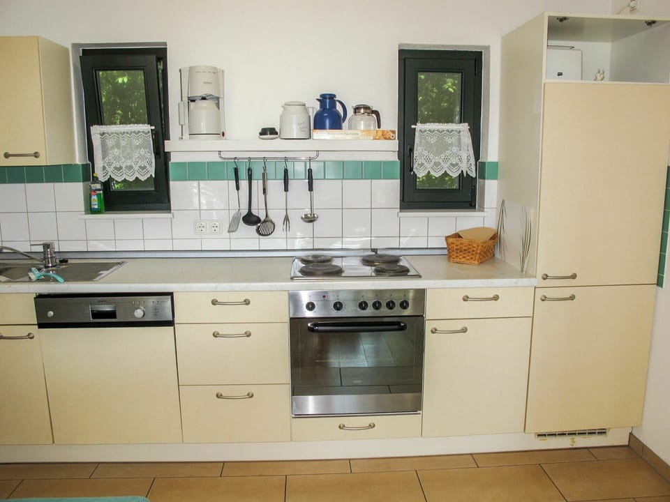 Cabinetry, Countertop, Sink, Kitchen Sink, Tap, Kitchen Appliance, Kitchen Stove, Kitchen, Home Appliance, Gas Stove