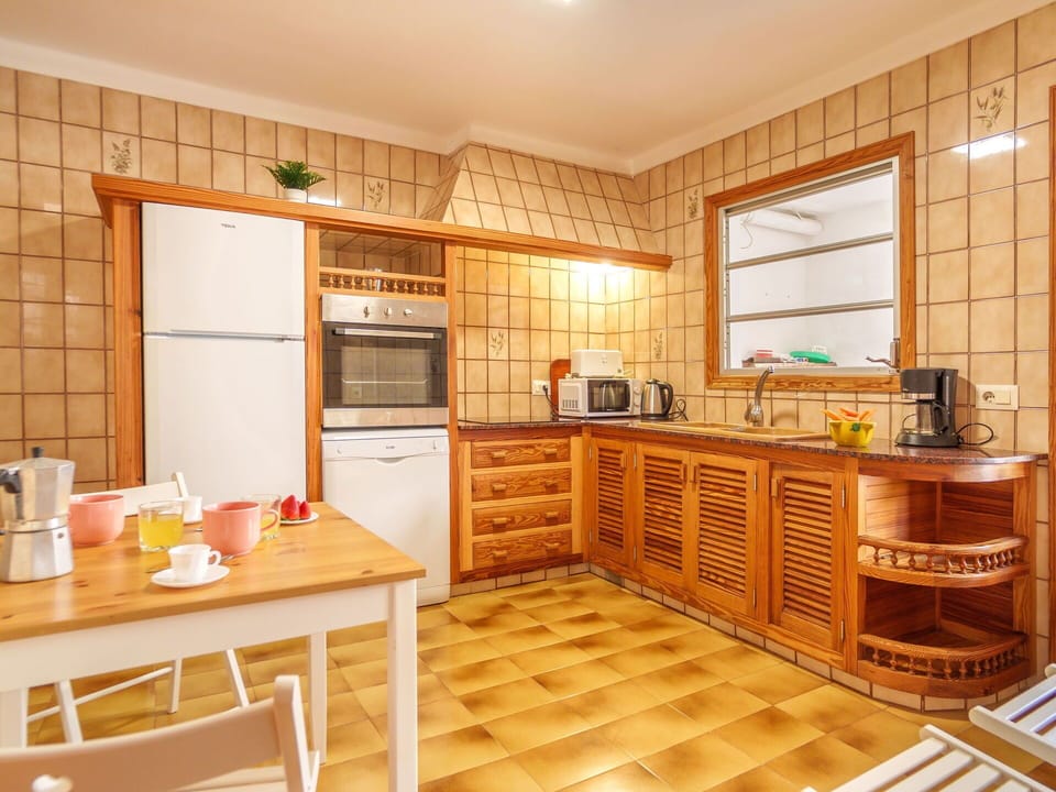 Cabinetry, Furniture, Countertop, Property, Kitchen, Window, Table, Wood, Sink, Home Appliance