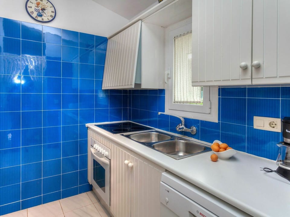 Property, Room, Blue, Bathroom, Tile, Real Estate, Interior Design, Cabinetry, Building, Furniture