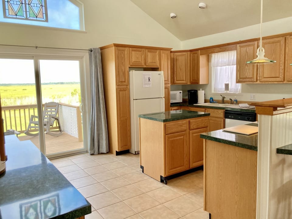 Deck off of upstairs kitchen