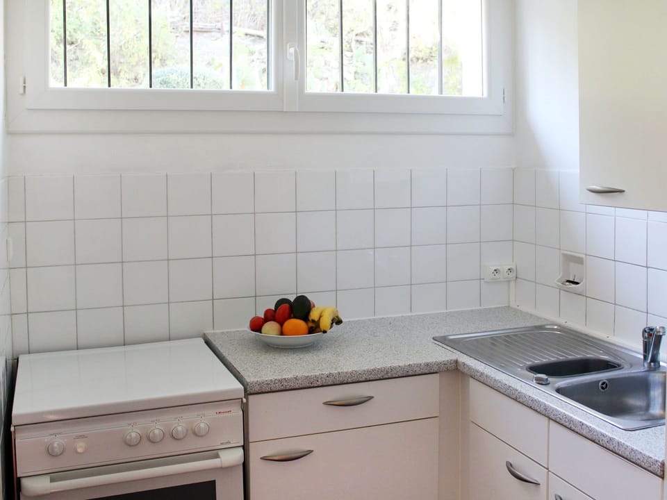 Countertop, Tile, Room, Property, Kitchen, Cabinetry, Furniture, Floor, Interior Design, Sink