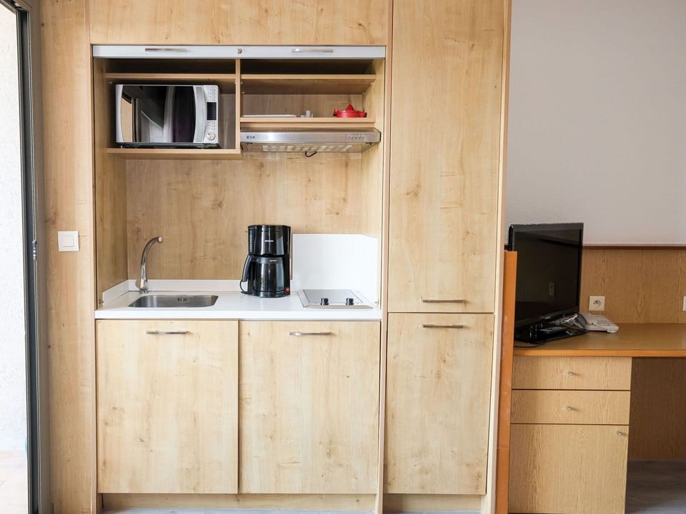 Cabinetry, Countertop, Furniture, Building, Kitchen, Kitchen Appliance, Wood, Kitchen Sink, Interior Design, Kitchen Stove