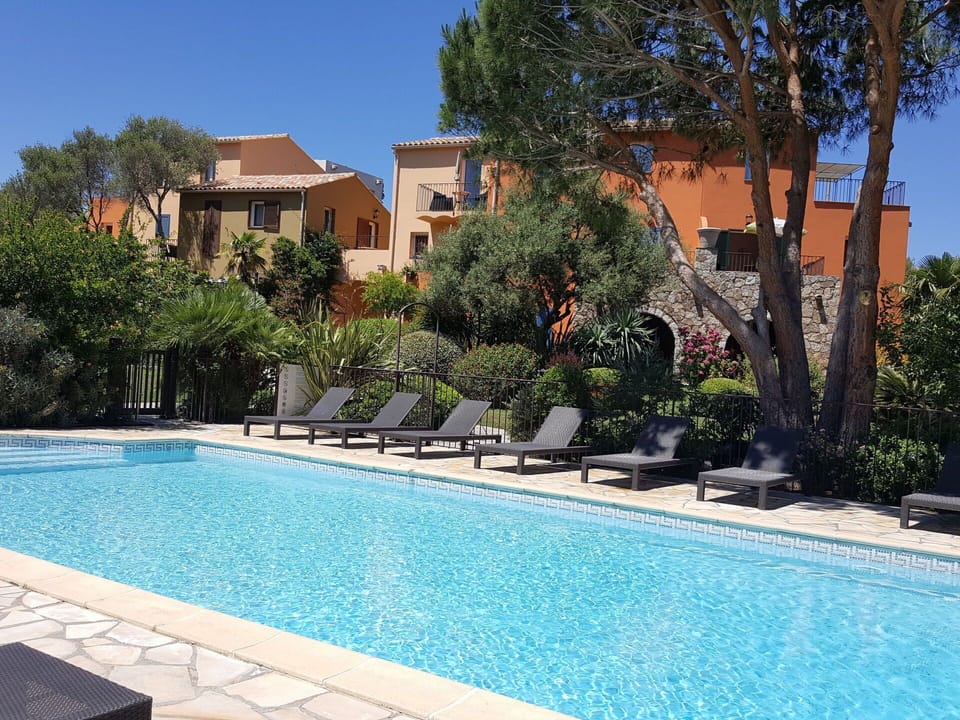 Water, Plant, Property, Sky, Building, Azure, Swimming Pool, Tree, Shade, Architecture