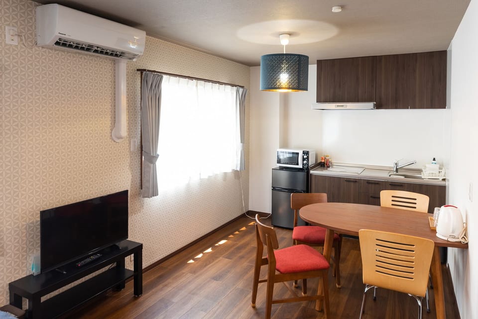 Family Room with Private Bathroom | Down comforters, blackout drapes, free WiFi