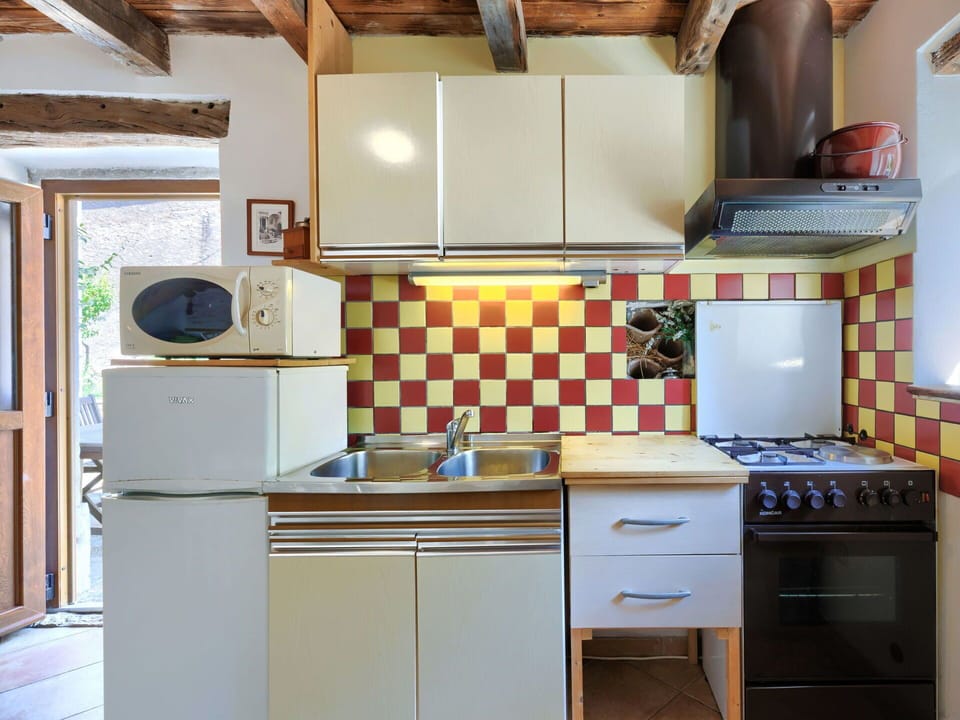 Cabinetry, Furniture, Building, Kitchen Stove, Kitchen, Kitchen Appliance, Home Appliance, Wood, Interior Design, Flooring