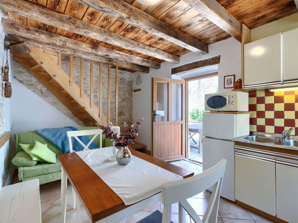 Property, Furniture, Table, Cabinetry, Wood, Interior Design, Lighting, Building, Flooring, Floor