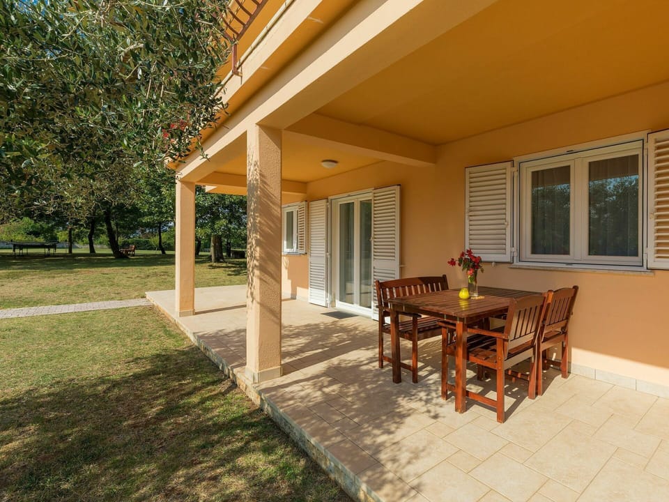 Plant, Building, Furniture, Table, Property, Window, Shade, Tree, Wood, Architecture