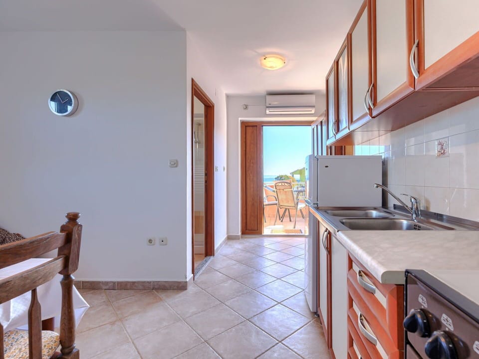 Wood, Flooring, Floor, Furniture, Interior Design, Kitchen, Major Appliance, Ceiling, Wood Stain, Countertop