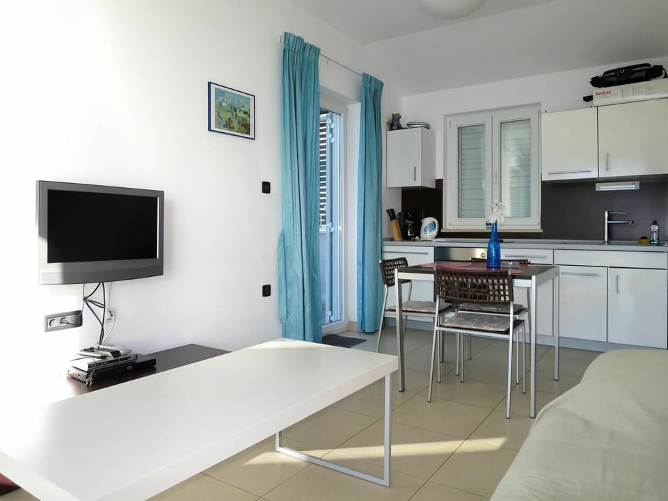 Room, Furniture, Property, Interior Design, Turquoise, Building, House, Floor, Table, Kitchen