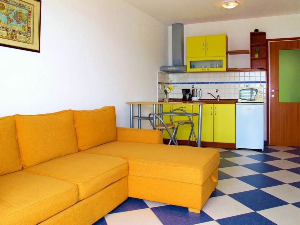 Room, Yellow, Property, Furniture, Interior Design, Living Room, Orange, Building, Floor, House