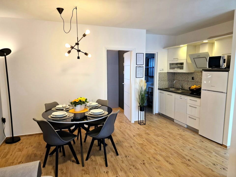 Table, Furniture, Property, Cabinetry, Wood, Chair, Countertop, Interior Design, Flooring, Floor