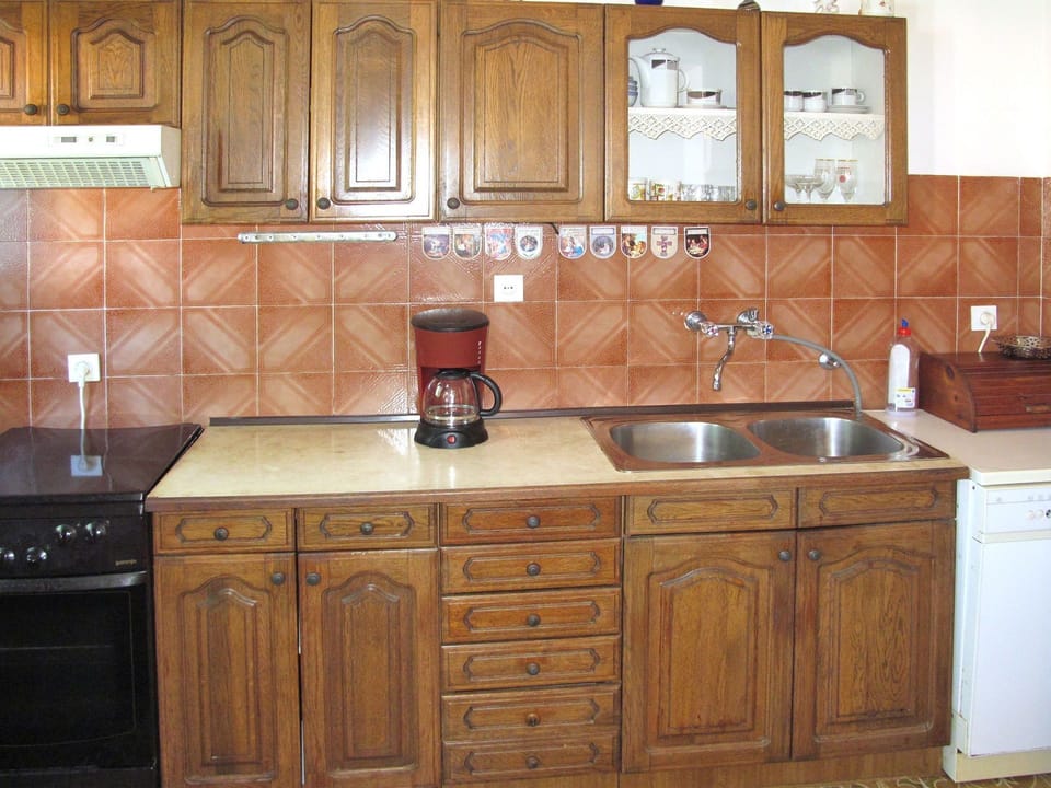 Countertop, Cabinetry, Furniture, Kitchen, Room, Property, Sink, Wood Stain, Drawer, Cupboard