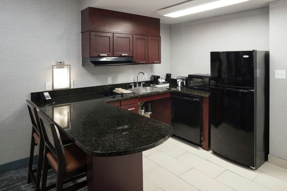 Suite, 1 King Bed with Sofa bed, Accessible (Roll-In Shower) | Private kitchen | Fridge, coffee/tea maker