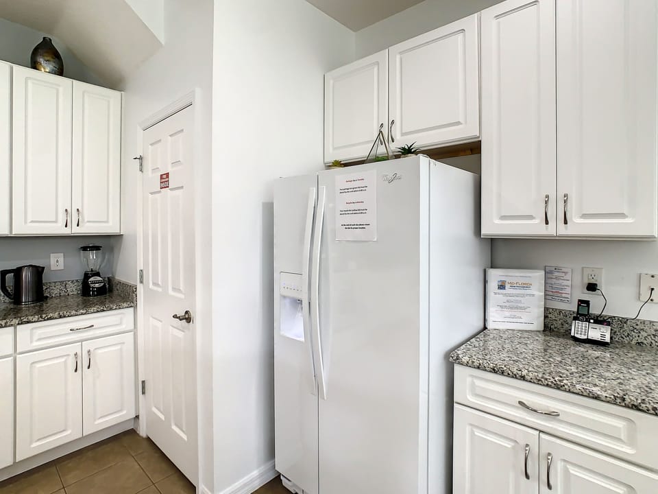 Refrigerator and pantry provide plenty of room for all your culinary needs.