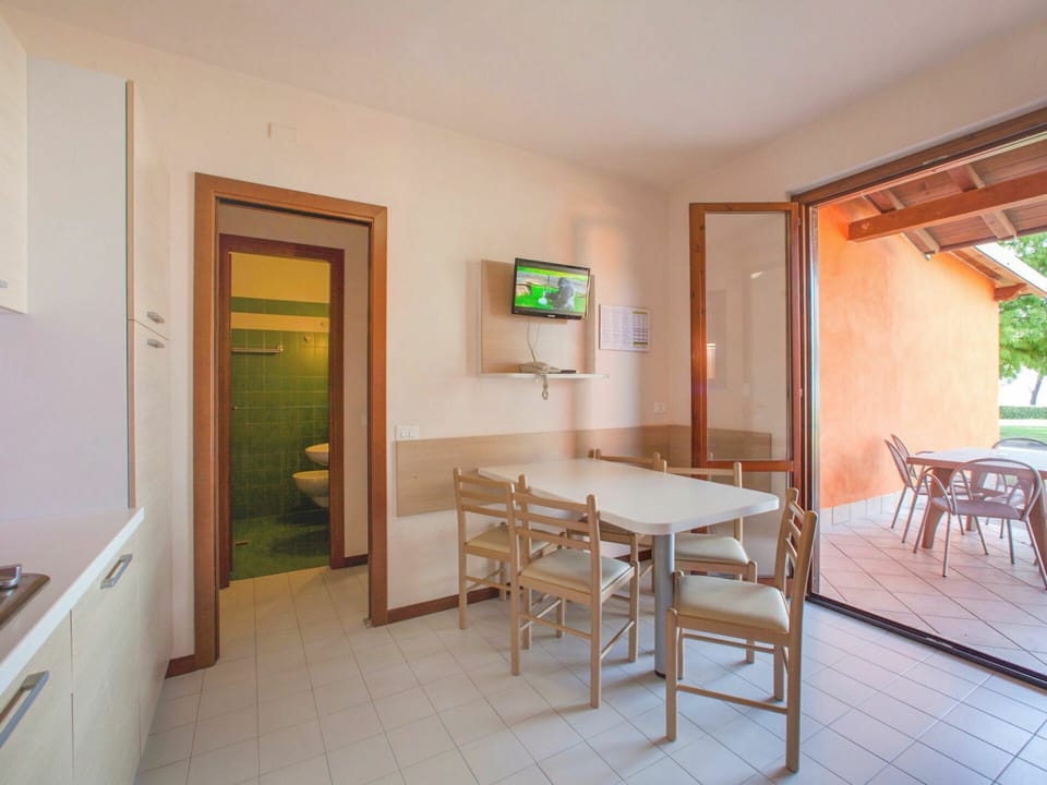 Furniture, Property, Table, Plant, Chair, Picture Frame, Wood, Interior Design, Flooring, Floor