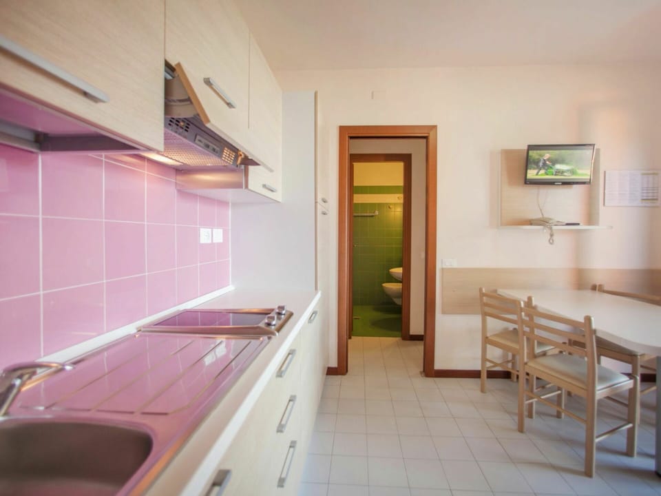 Furniture, Property, Cabinetry, Building, Countertop, Wood, Table, Picture Frame, Architecture, Interior Design