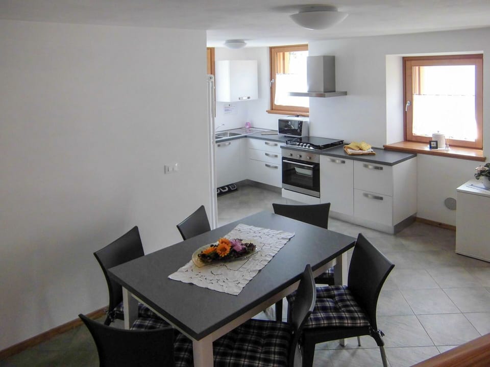 Table, Furniture, Cabinetry, Window, Sink, Chair, Countertop, Wood, Building, Kitchen