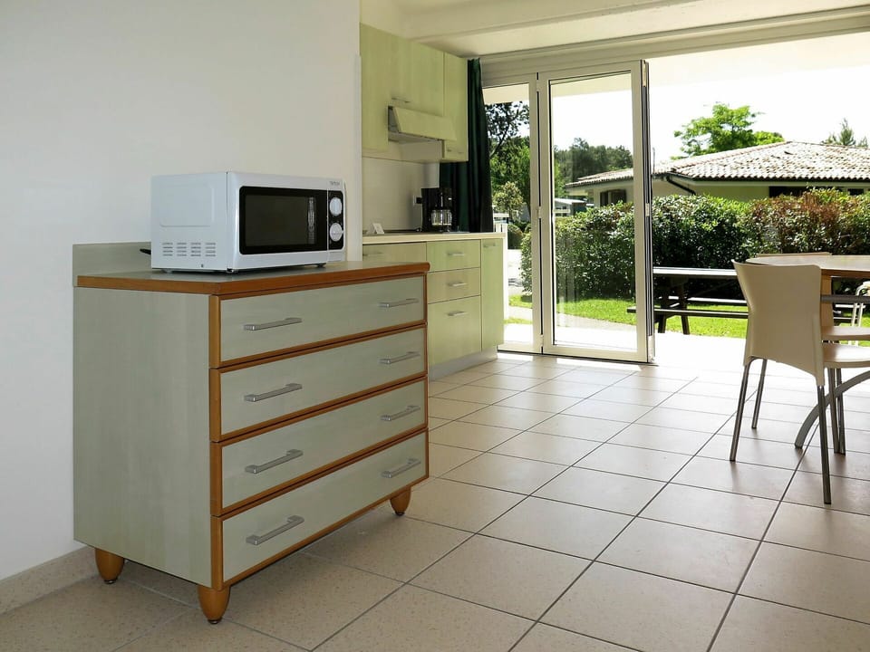 Cabinetry, Furniture, Table, Plant, Building, Wood, Drawer, Chair, Interior Design, House