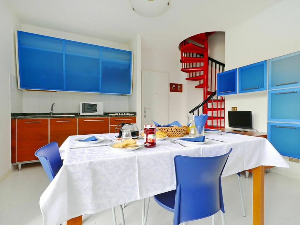 Table, Furniture, Chair, Interior Design, Orange, Television, Window, Flooring, Building, Floor