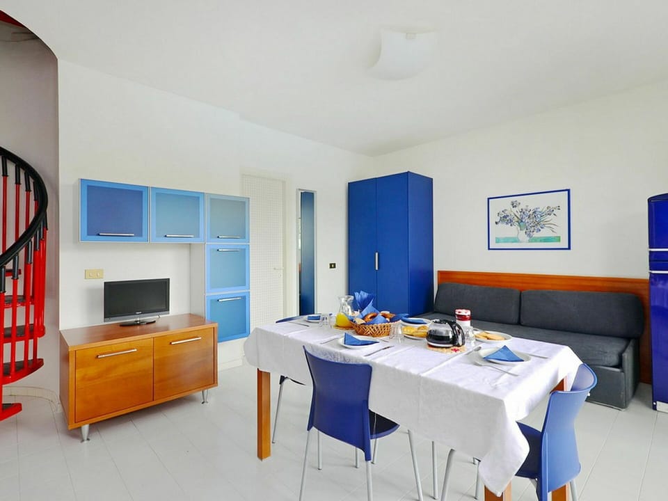 Table, Property, Furniture, Building, Blue, Azure, Picture Frame, Orange, Desk, Cabinetry