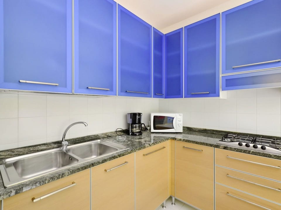 Property, Cabinetry, Room, Countertop, Kitchen, Furniture, Interior Design, Real Estate, Yellow, Architecture