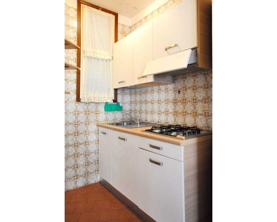 Property, Room, Kitchen, Cabinetry, Tile, Countertop, Furniture, House, Floor, Interior Design