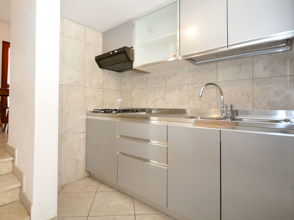 Property, Room, Tile, Cabinetry, Furniture, Countertop, Interior Design, Kitchen, Floor, Sink