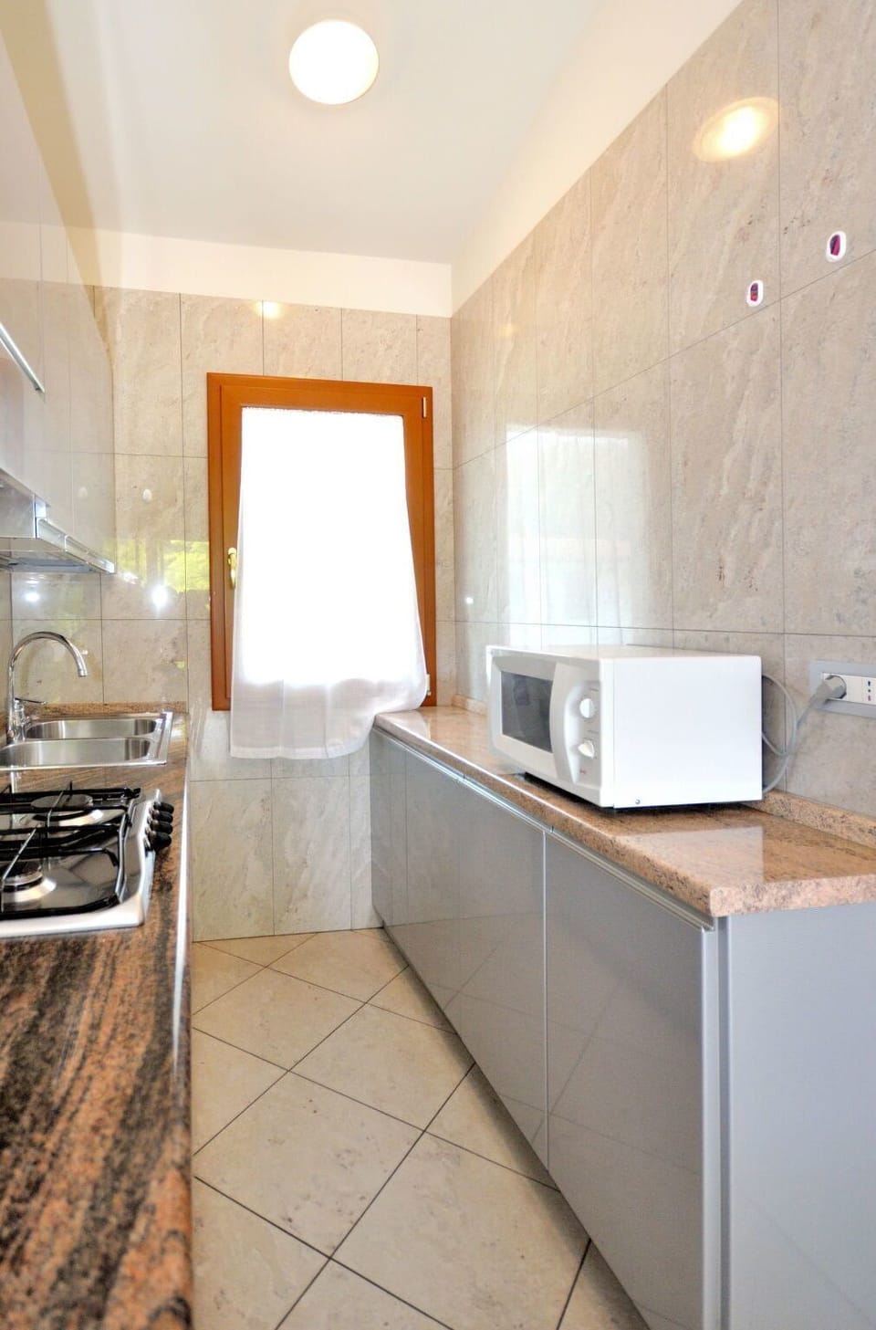 Property, Room, Interior Design, Furniture, Countertop, Tile, Bathroom, Cabinetry, Building, Floor