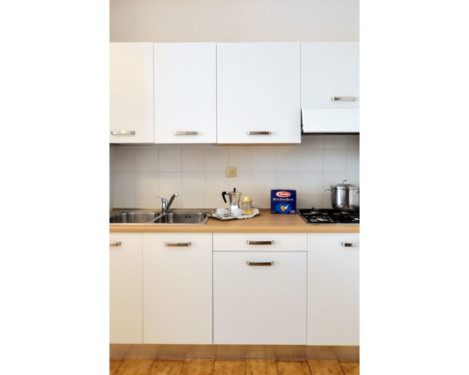 Countertop, Kitchen, Room, Property, Cabinetry, Furniture, Floor, Interior Design, House, Tile