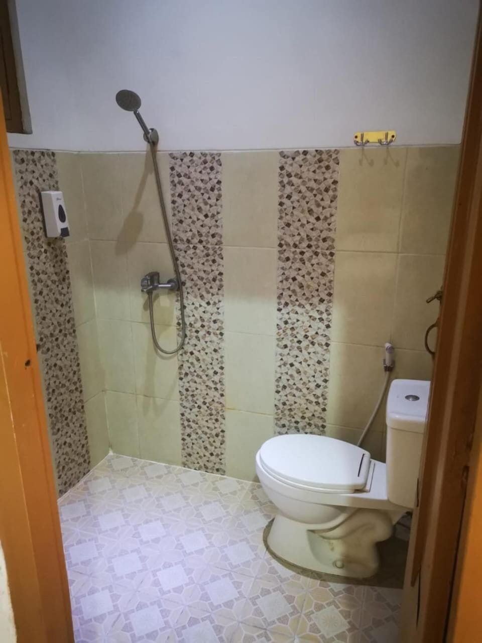 Shower, rainfall showerhead, towels, soap