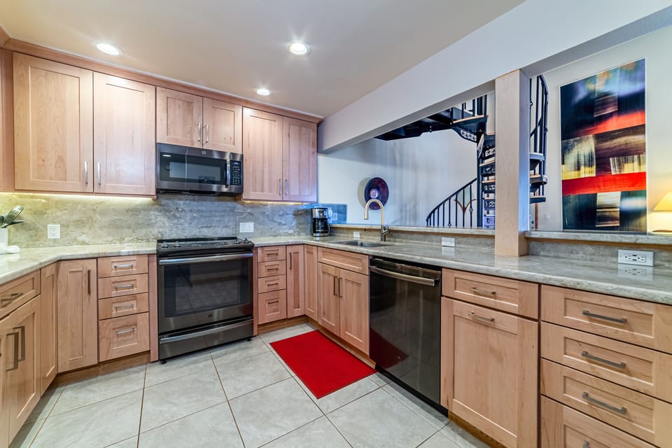 Newly updated kitchen with quartz countertops.