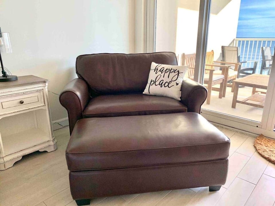 Over sized leather chair is so comfortable! The chair also has a smaller, twin sleeper. The ottoman offers extra seating or comfort to stretch out and relax. Additionally, it stores the bedding for the sleeper bed. 