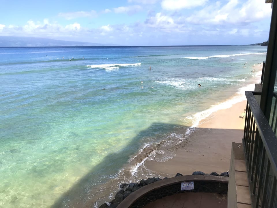 North end view from unit #407 white sandy beach and warm tropical water.