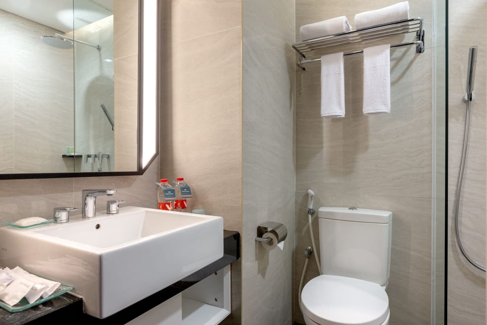 Shower, slippers, towels, soap