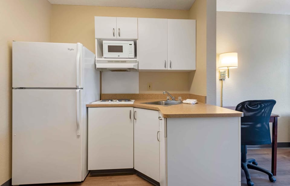 Studio, 1 Queen Bed, Non Smoking | Private kitchen | Full-size fridge, microwave, stovetop, coffee/tea maker