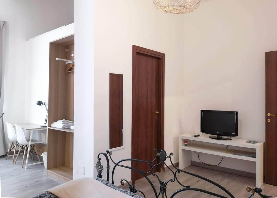 Deluxe Room (3rd floor, stair access only) | Living area | Flat-screen TV