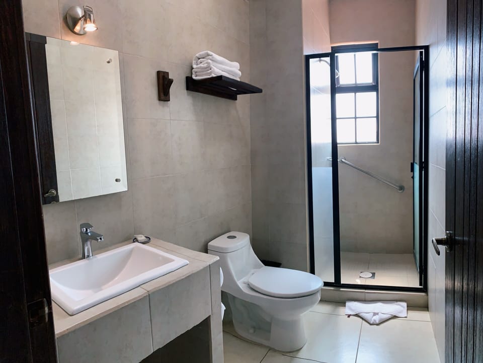 Shower, towels, soap, shampoo