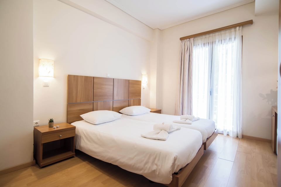 Triple Room | Premium bedding, in-room safe, blackout drapes, soundproofing