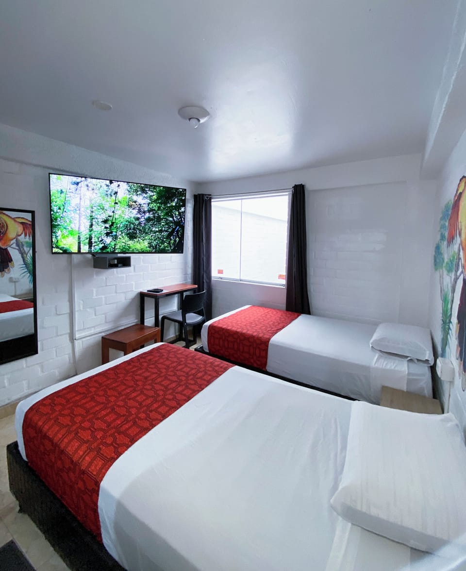 Basic Twin Room | Blackout drapes, iron/ironing board, free WiFi, bed sheets