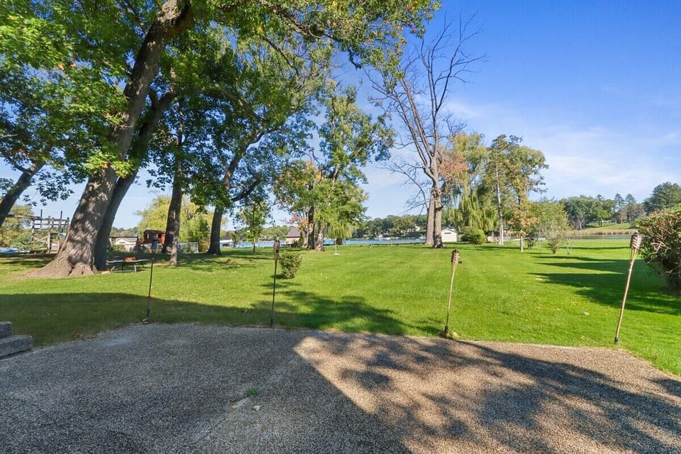 Spacious back yard that leads to the lake.
