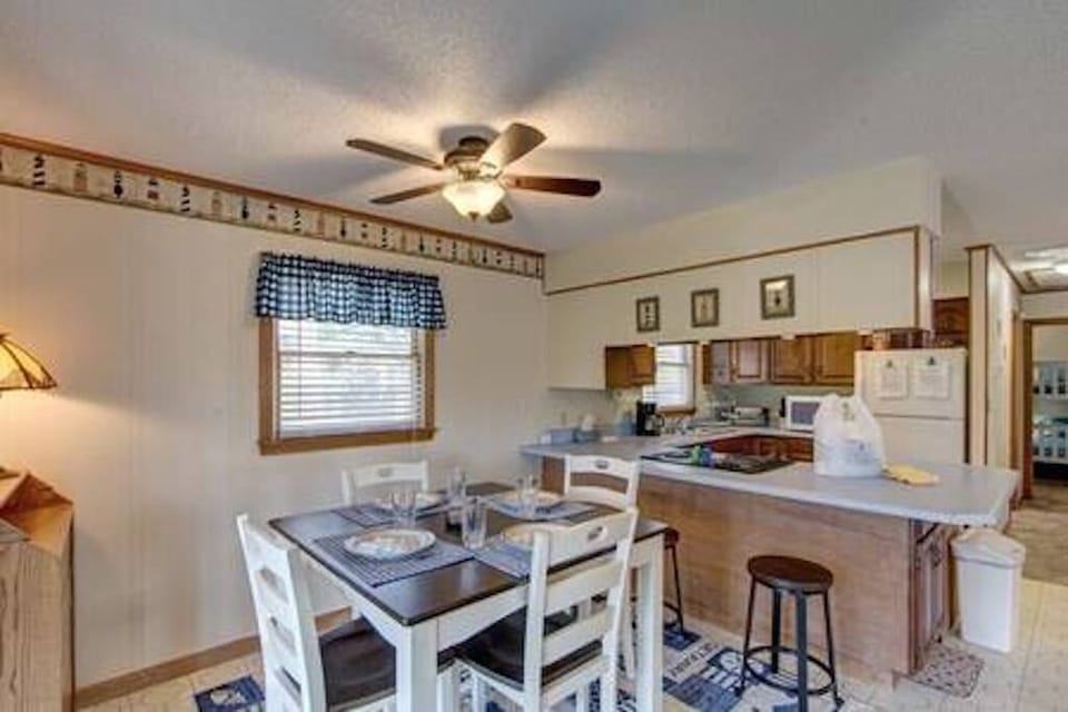 Dining Area and Bar around stove