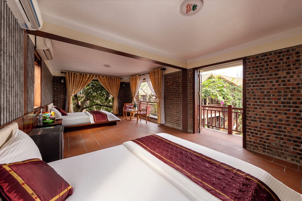 Family Room, 2 Queen Beds, Garden View | Living area
