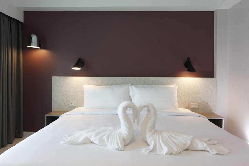King Room with Balcony | Minibar, desk, blackout drapes, soundproofing